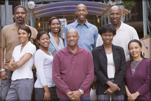 Group of people standing outside of a building.